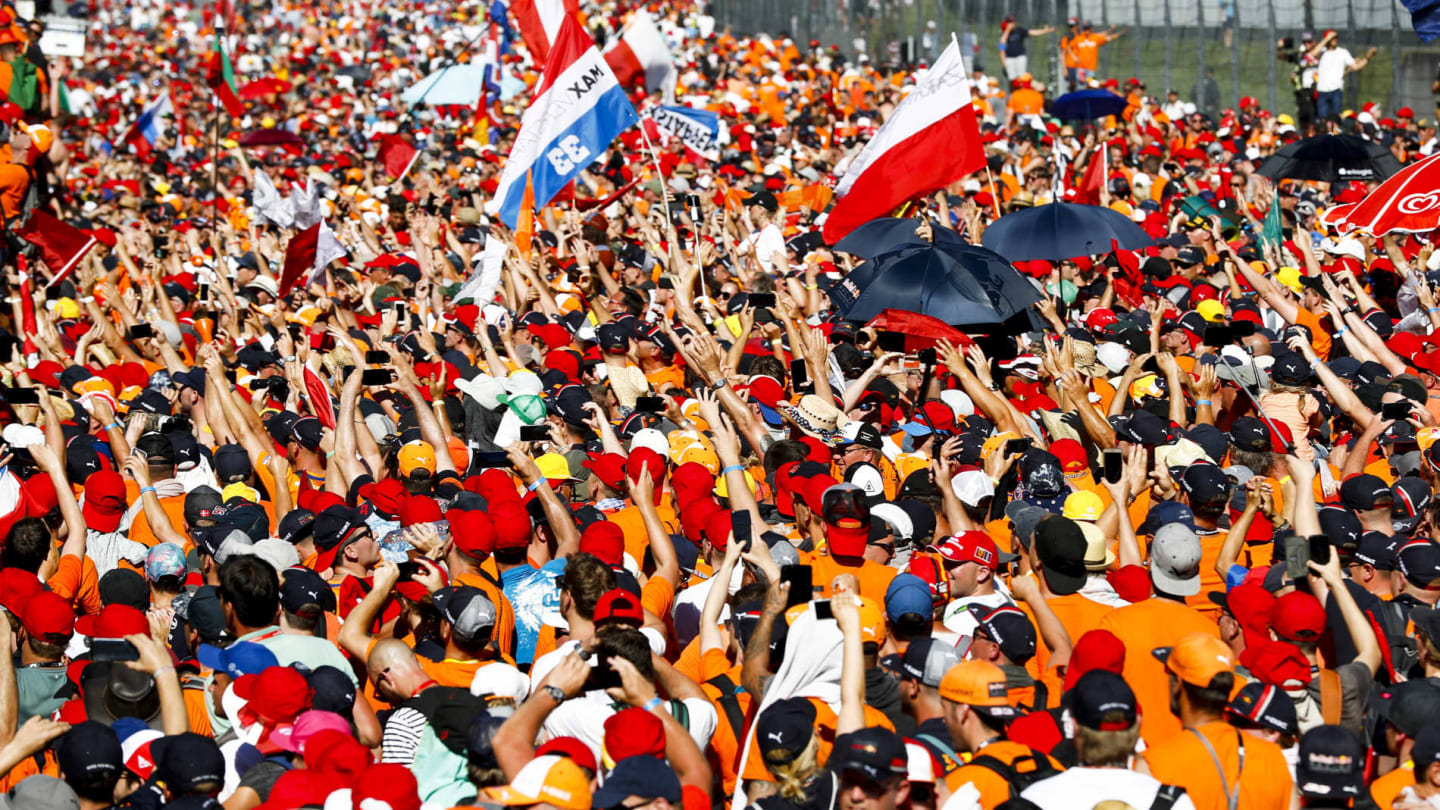 RED BULL RING, AUSTRIA - JUNE 30: Dutch Max Verstappen fans storm the track to celebrate the