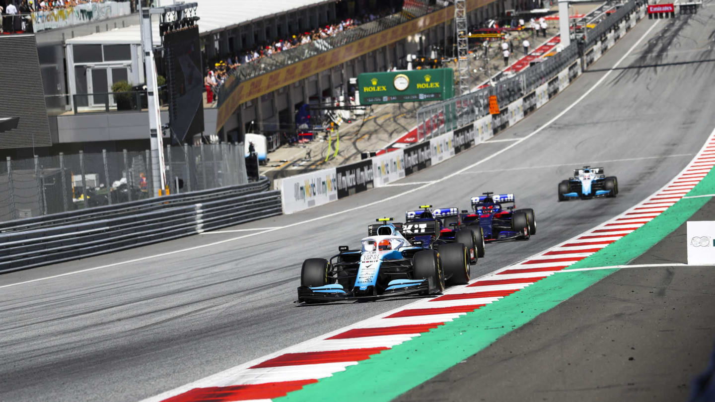 RED BULL RING, AUSTRIA - JUNE 30: Robert Kubica, Williams FW42, leads Alexander Albon, Toro Rosso