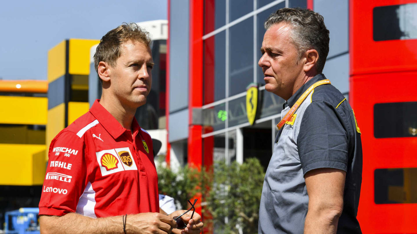 RED BULL RING, AUSTRIA - JUNE 27: Sebastian Vettel, Ferrari an Mario Isola, Racing Manager, Pirelli