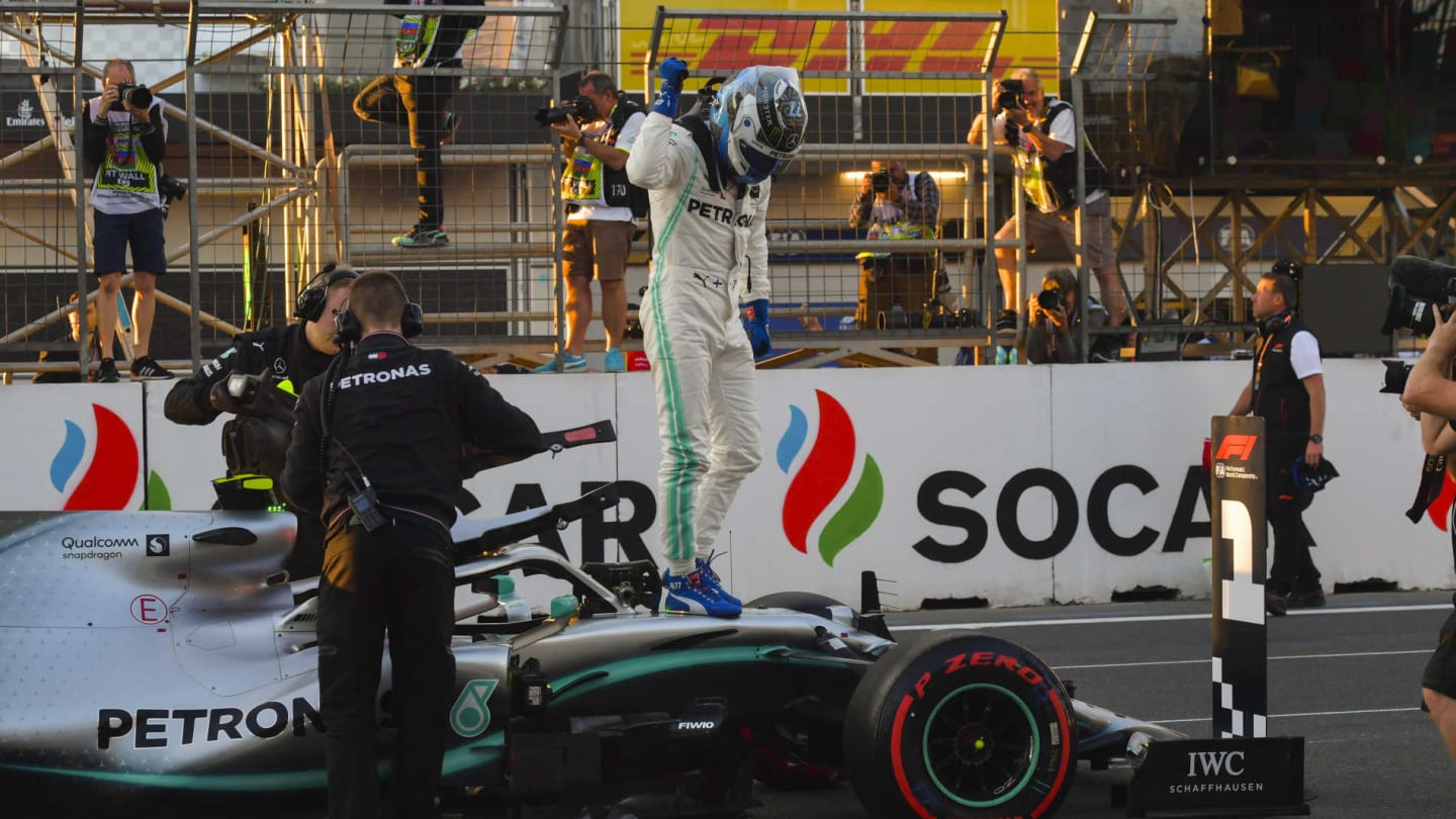 BAKU CITY CIRCUIT, AZERBAIJAN - APRIL 27: Pole man Valtteri Bottas, Mercedes AMG F1, celebrates on his car after Qualifying during the Azerbaijan GP at Baku City Circuit on April 27, 2019 in Baku City Circuit, Azerbaijan. (Photo by Jerry Andre / Sutton Images)