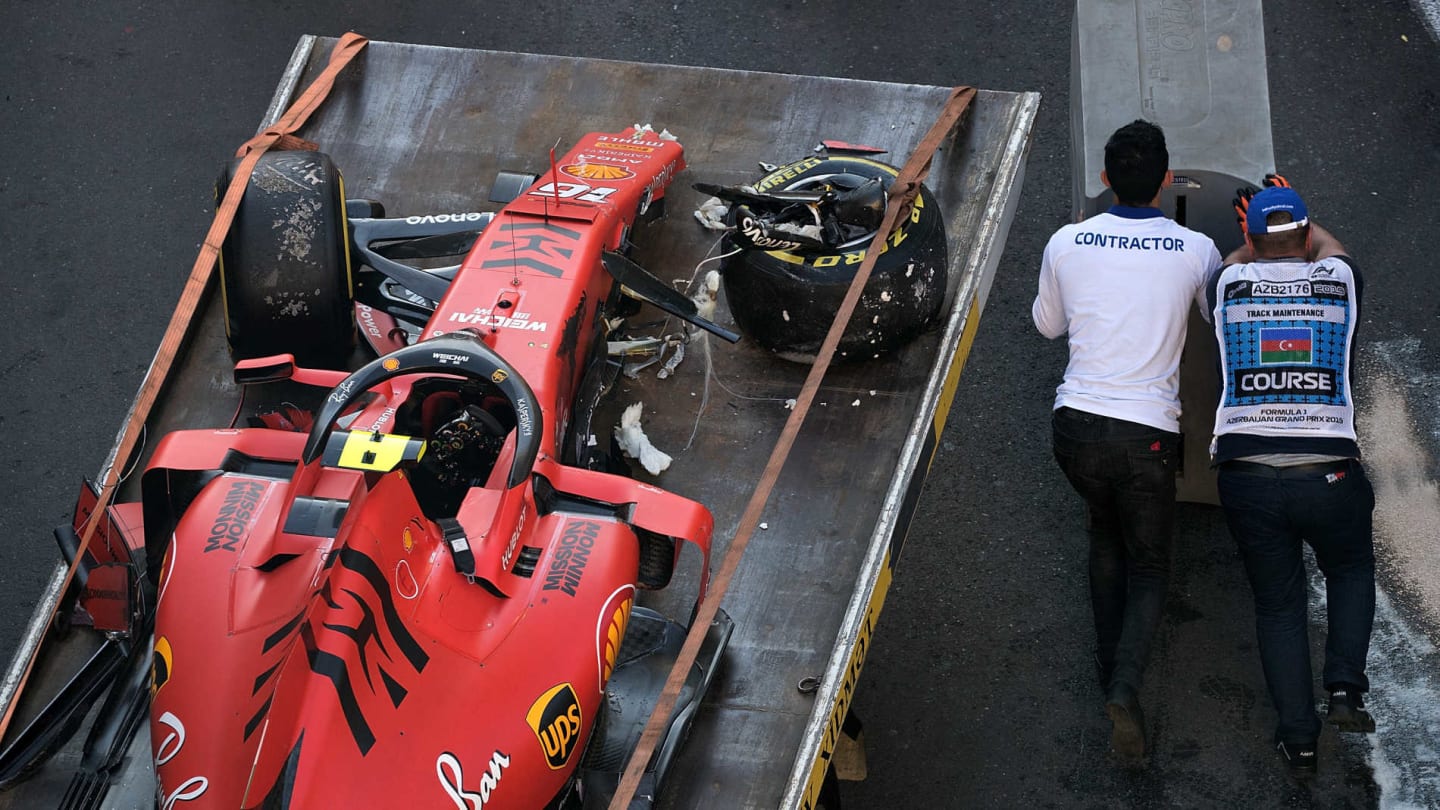 BAKU CITY CIRCUIT, AZERBAIJAN - APRIL 27: Marshals begin to rebuild a crash barrier after removing