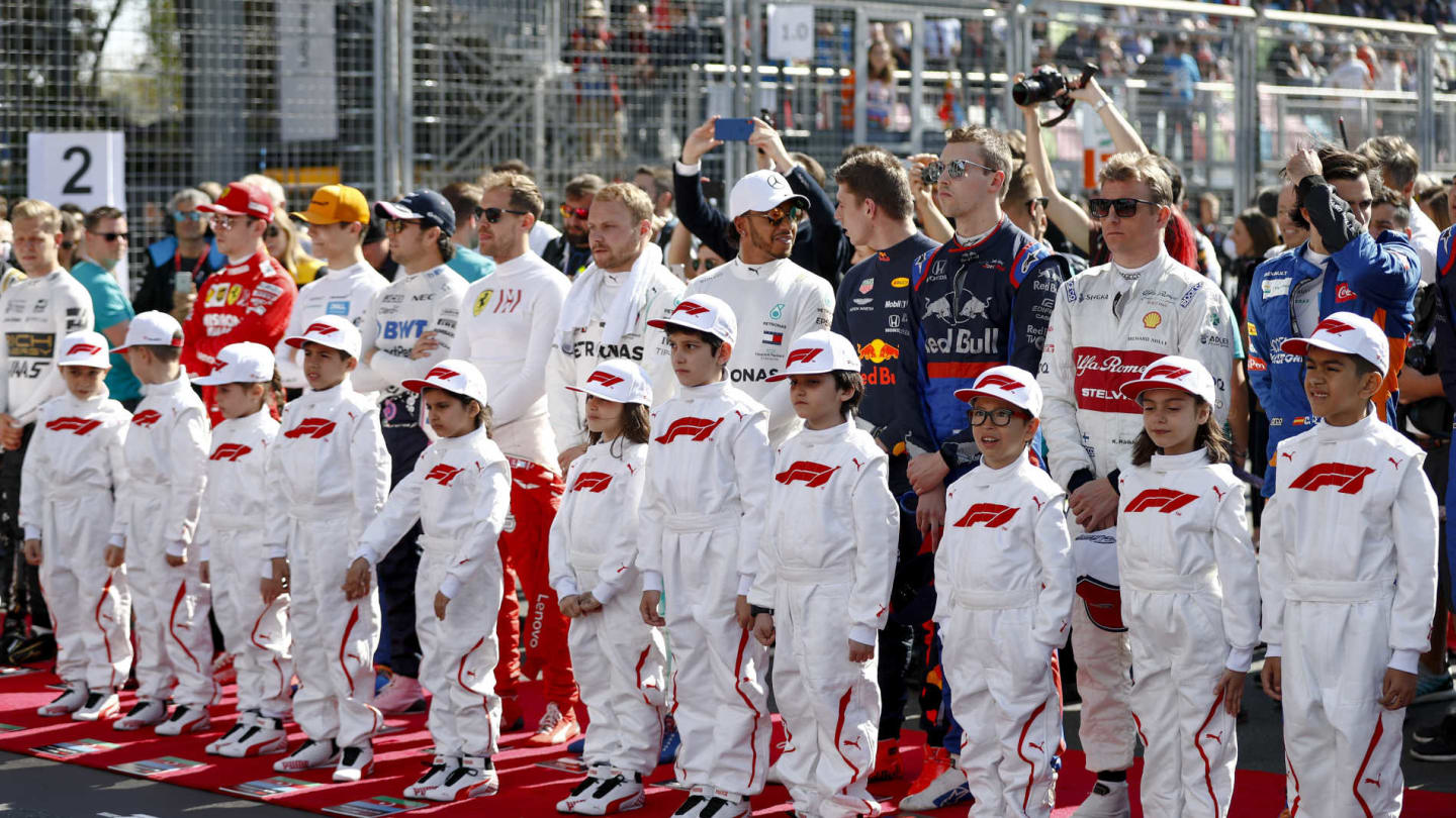 BAKU CITY CIRCUIT, AZERBAIJAN - APRIL 28: Drivers and Grid Kids during the National Anthem on the