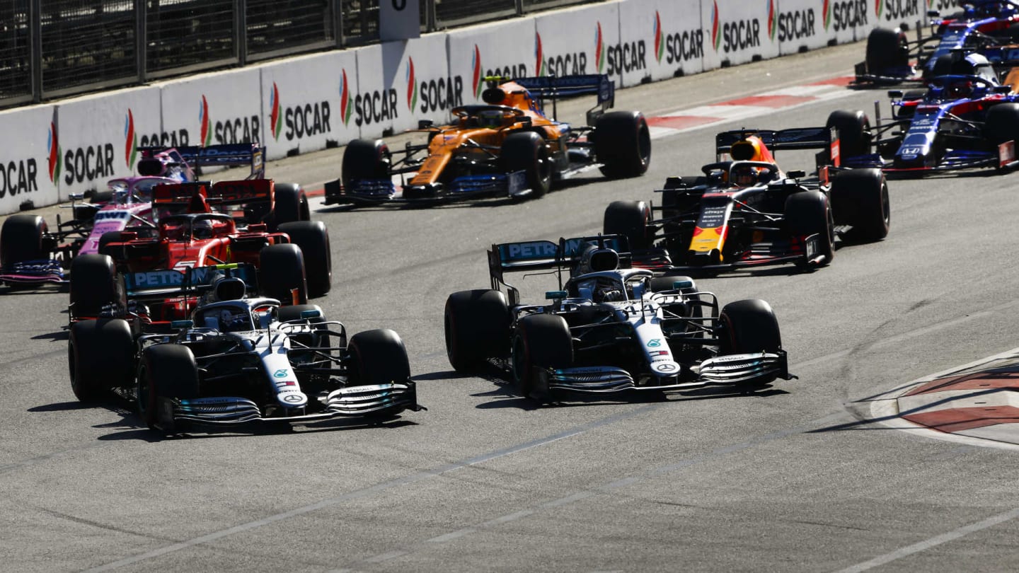 BAKU CITY CIRCUIT, AZERBAIJAN - APRIL 28: Valtteri Bottas, Mercedes AMG W10, leads Lewis Hamilton,