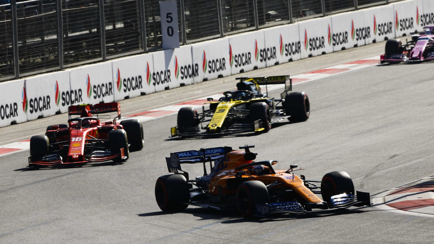 BAKU CITY CIRCUIT, AZERBAIJAN - APRIL 28: Carlos Sainz Jr., McLaren MCL34, leads Charles Leclerc,