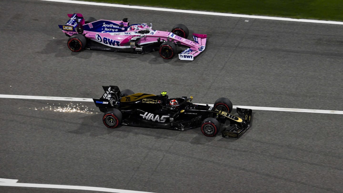 BAHRAIN INTERNATIONAL CIRCUIT, BAHRAIN - MARCH 31: Sergio Perez, Racing Point RP19 and Kevin Magnussen, Haas VF-19 during the Bahrain GP at Bahrain International Circuit on March 31, 2019 in Bahrain International Circuit, Bahrain. (Photo by Mark Sutton / Sutton Images)