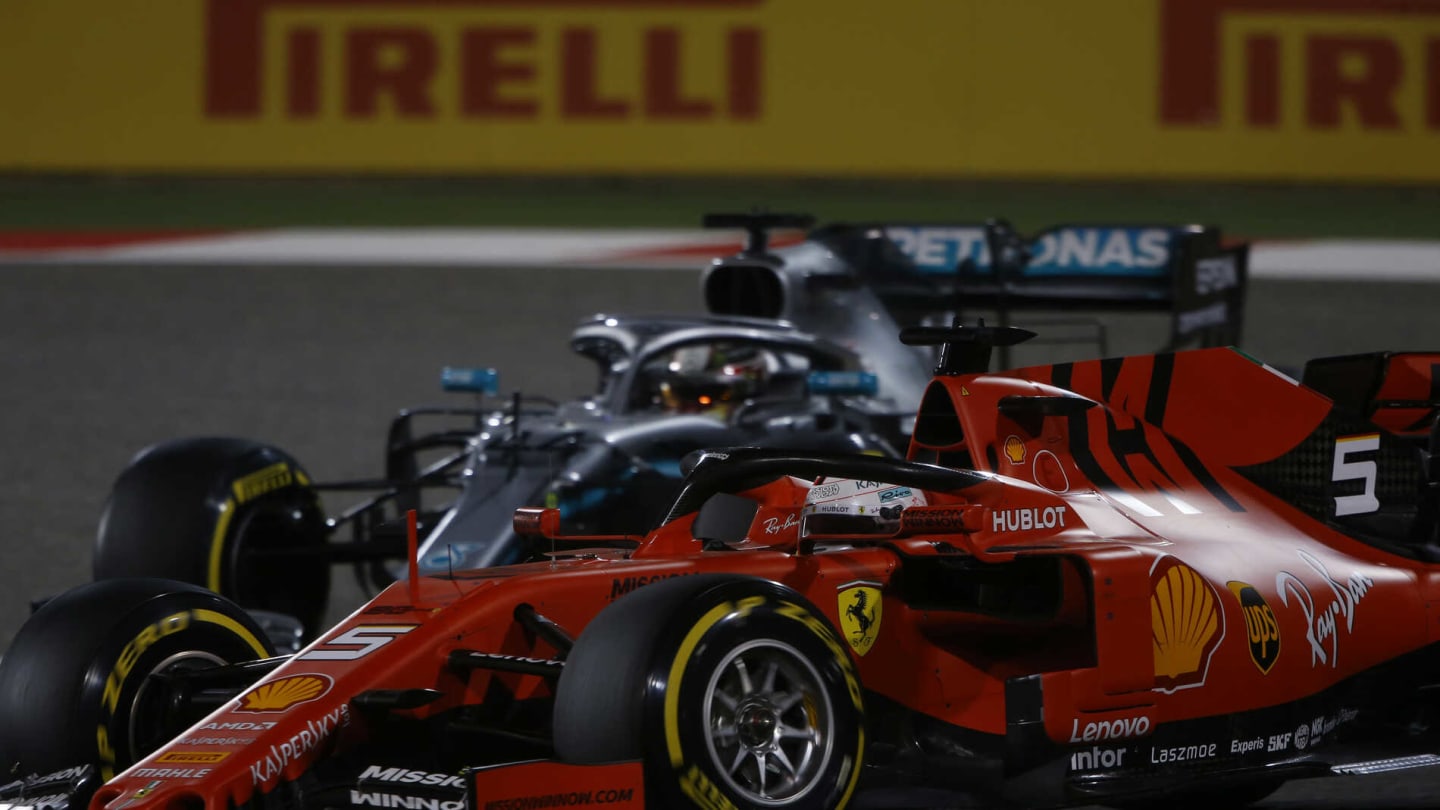 BAHRAIN INTERNATIONAL CIRCUIT, BAHRAIN - MARCH 31: Sebastian Vettel, Ferrari SF90, leads Lewis