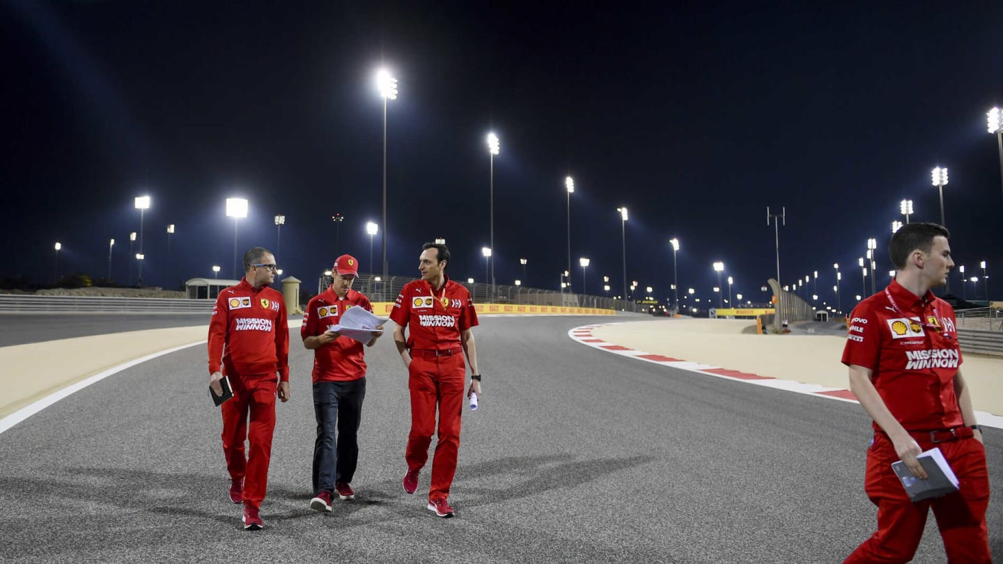 BAHRAIN INTERNATIONAL CIRCUIT, BAHRAIN - MARCH 28: Sebastian Vettel, Ferrari walks the track with
