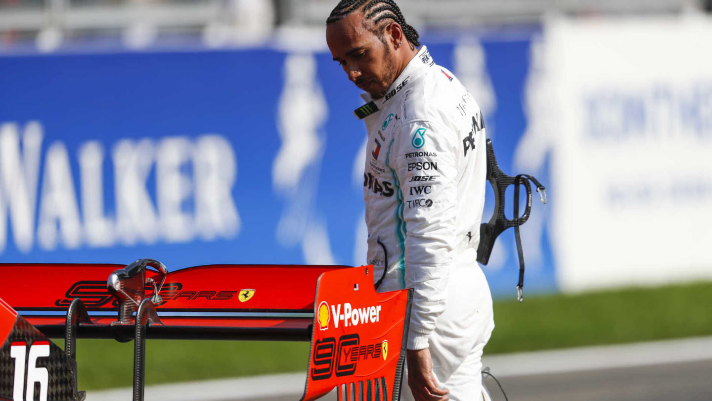 SPA-FRANCORCHAMPS, BELGIUM - AUGUST 31: Lewis Hamilton, Mercedes AMG F1, inspects the Charles