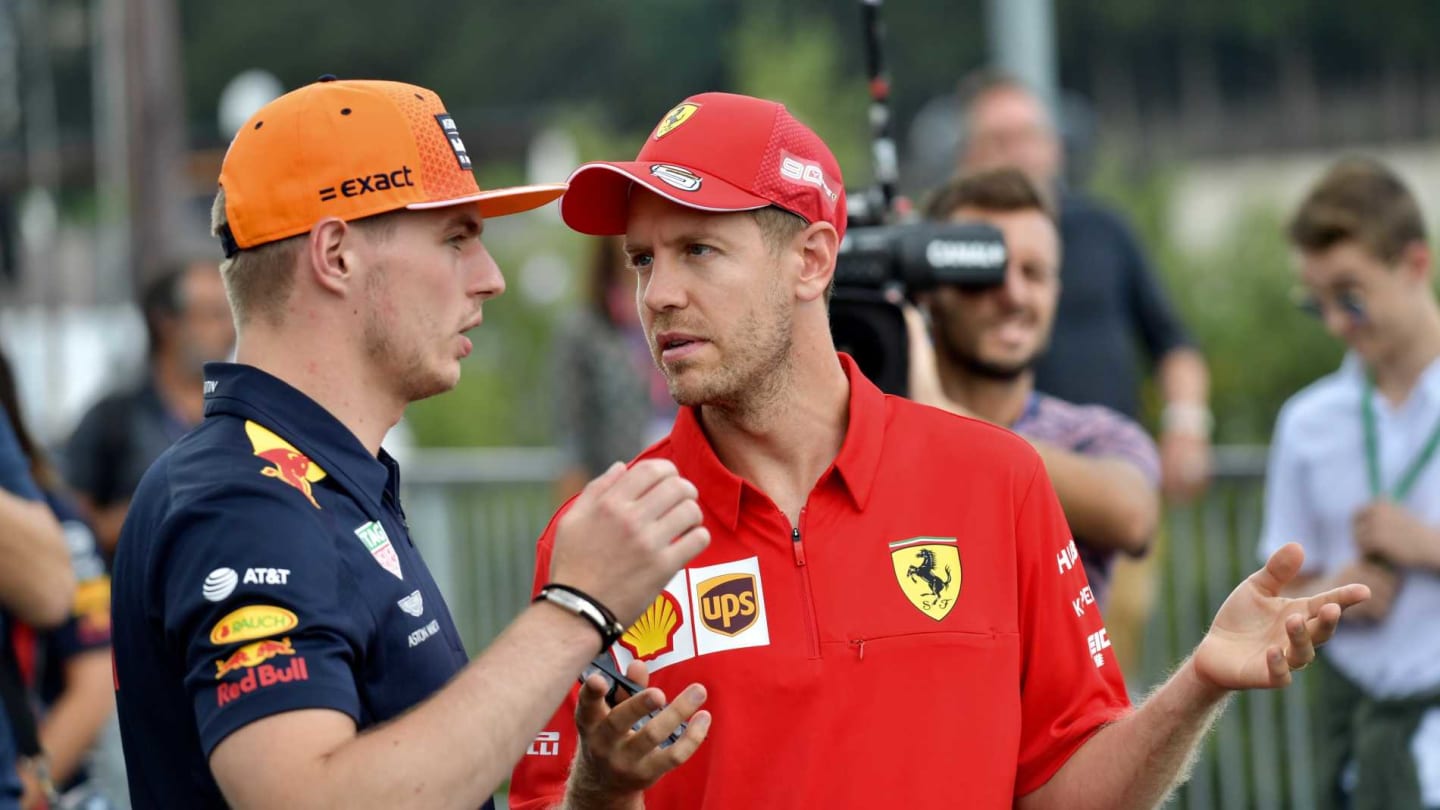 SPA-FRANCORCHAMPS, BELGIUM - AUGUST 29: Sebastian Vettel, Ferrari, and Max Verstappen, Red Bull