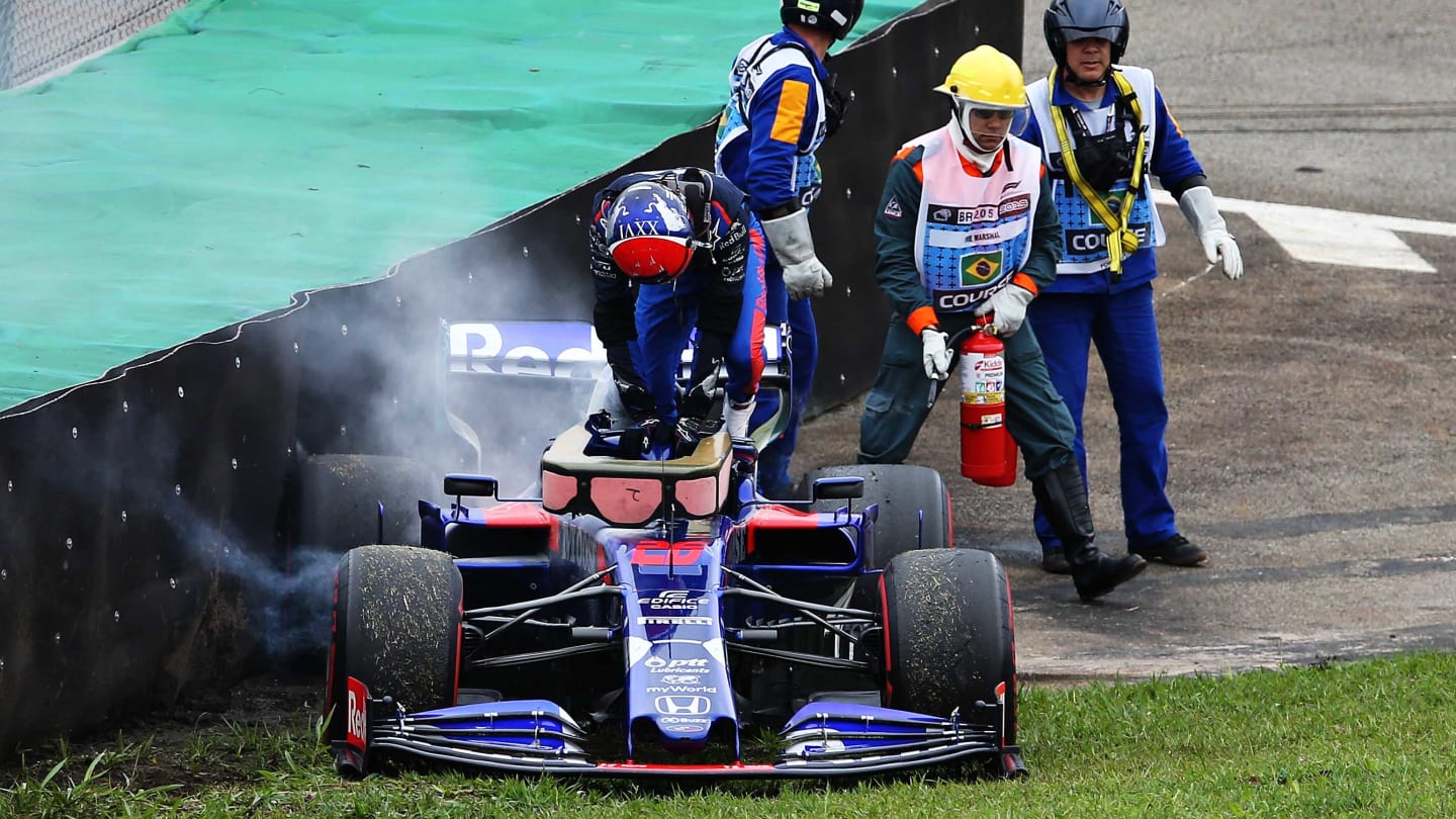 SAO PAULO, BRAZIL - NOVEMBER 15: Daniil Kvyat of Russia and Scuderia Toro Rosso climbs from his car after crashing during practice for the F1 Grand Prix of Brazil at Autodromo Jose Carlos Pace on November 15, 2019 in Sao Paulo, Brazil. (Photo by Charles Coates/Getty Images)