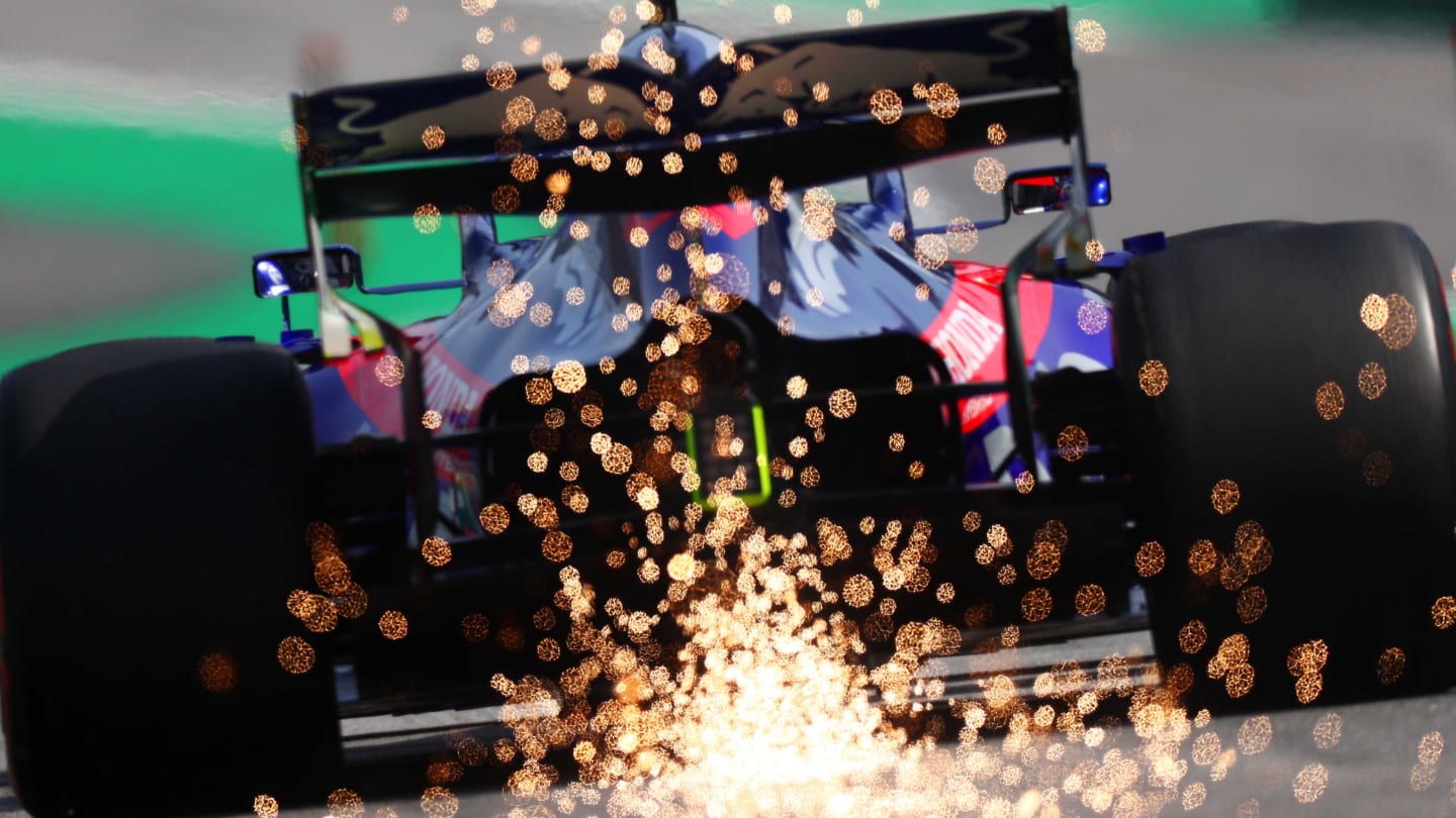 SAO PAULO, BRAZIL - NOVEMBER 17: Sparks fly behind Pierre Gasly of France driving the (10) Scuderia Toro Rosso STR14 Honda on track during the F1 Grand Prix of Brazil at Autodromo Jose Carlos Pace on November 17, 2019 in Sao Paulo, Brazil. (Photo by Dan Istitene/Getty Images)