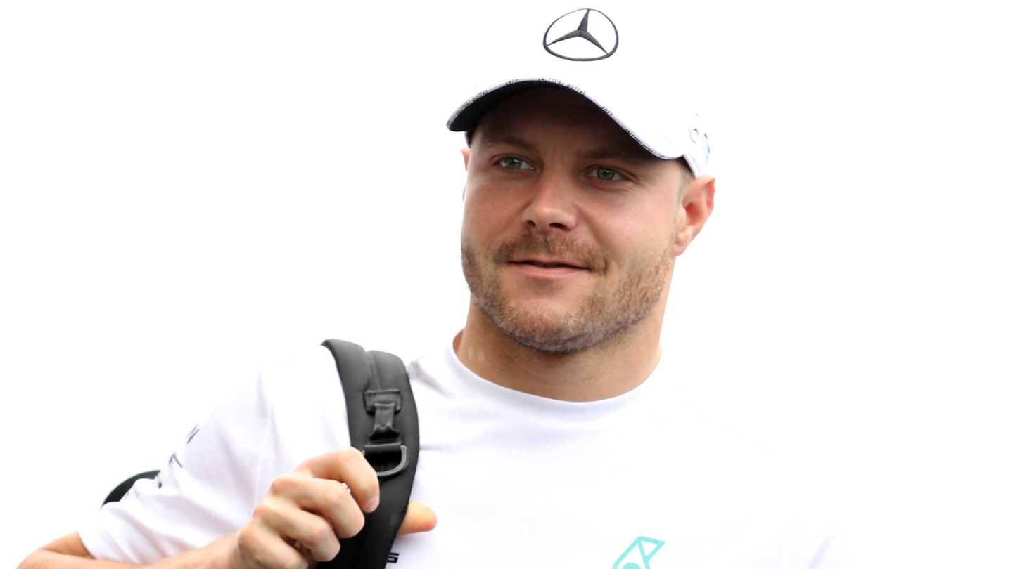 SAO PAULO, BRAZIL - NOVEMBER 14: Valtteri Bottas of Finland and Mercedes GP walks in the Paddock