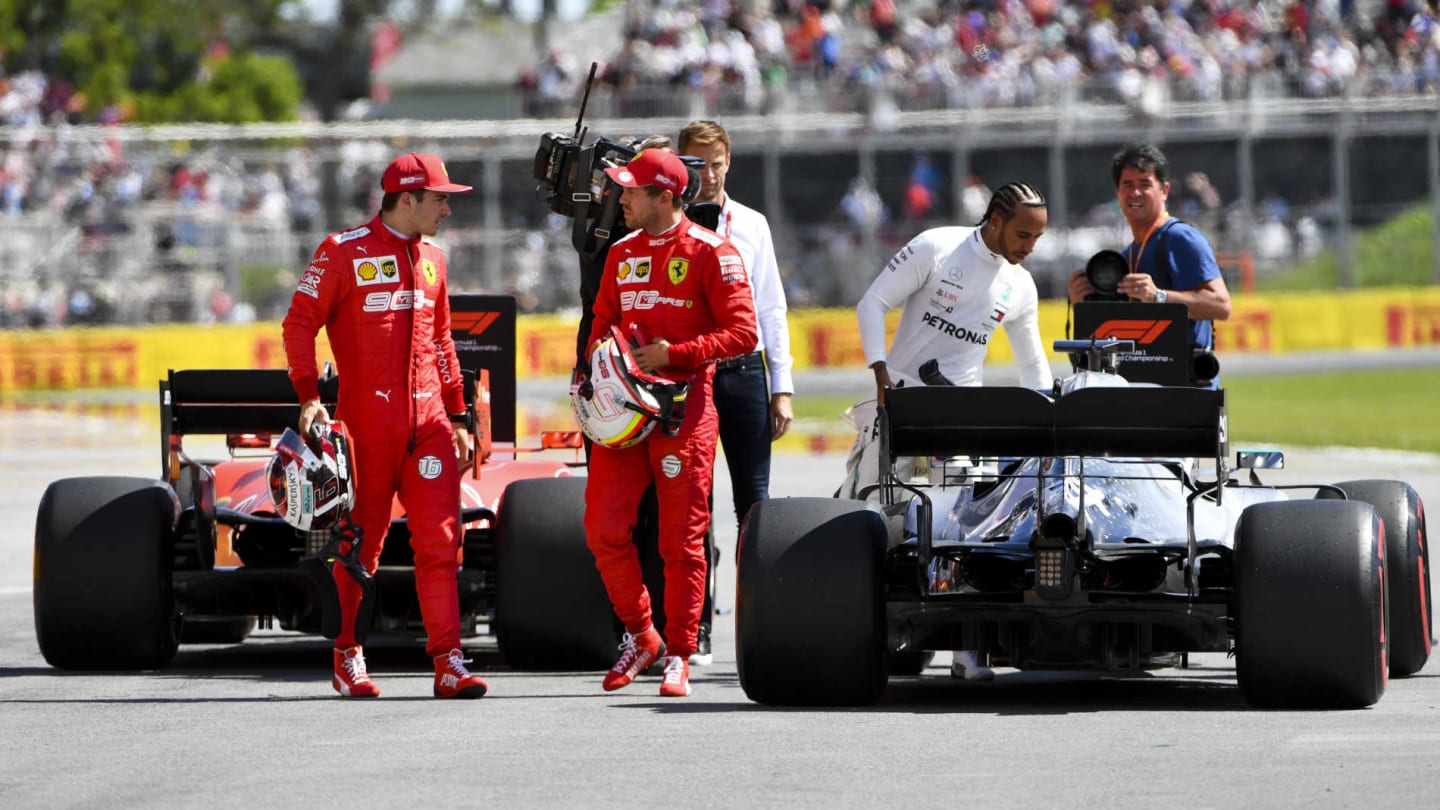 CIRCUIT GILLES-VILLENEUVE, CANADA - JUNE 08: Charles Leclerc, Ferrari, talks with pole man