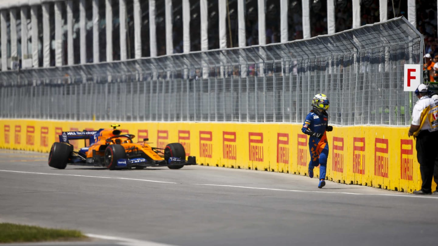 CIRCUIT GILLES-VILLENEUVE, CANADA - JUNE 09: Lando Norris, McLaren MCL34 runs away from his car after retiring from the race during the Canadian GP at Circuit Gilles-Villeneuve on June 09, 2019 in Circuit Gilles-Villeneuve, Canada. (Photo by Andy Hone / LAT Images)