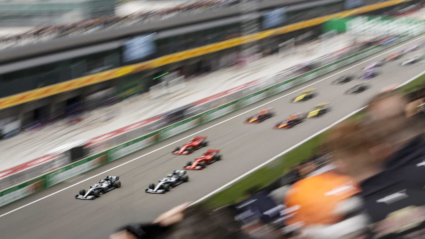 SHANGHAI INTERNATIONAL CIRCUIT, CHINA - APRIL 14: Valtteri Bottas, Mercedes AMG W10, Lewis Hamilton, Mercedes AMG F1 W10, Sebastian Vettel, Ferrari SF90 and Charles Leclerc, Ferrari SF90 at the start of the race during the Chinese GP at Shanghai International Circuit on April 14, 2019 in Shanghai International Circuit, China. (Photo by Zak Mauger / LAT Images)