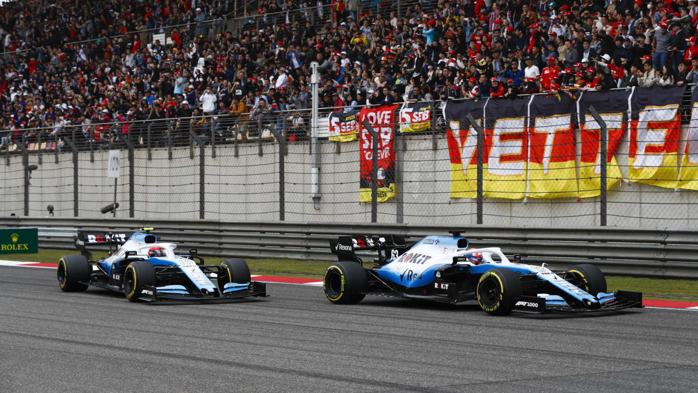 SHANGHAI INTERNATIONAL CIRCUIT, CHINA - APRIL 14: George Russell, Williams Racing FW42 leads Robert Kubica, Williams FW42 during the Chinese GP at Shanghai International Circuit on April 14, 2019 in Shanghai International Circuit, China. (Photo by Glenn Dunbar / LAT Images)