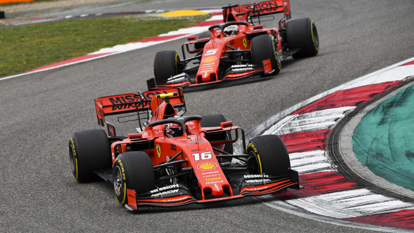 SHANGHAI INTERNATIONAL CIRCUIT, CHINA - APRIL 14: Charles Leclerc, Ferrari SF90, leads Sebastian