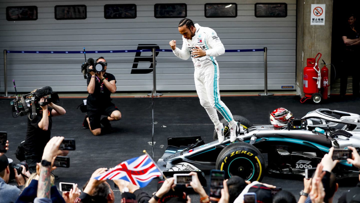 SHANGHAI INTERNATIONAL CIRCUIT, CHINA - APRIL 14: Lewis Hamilton, Mercedes AMG F1 celebrates in Parc Ferme during the Chinese GP at Shanghai International Circuit on April 14, 2019 in Shanghai International Circuit, China. (Photo by Glenn Dunbar / LAT Images)