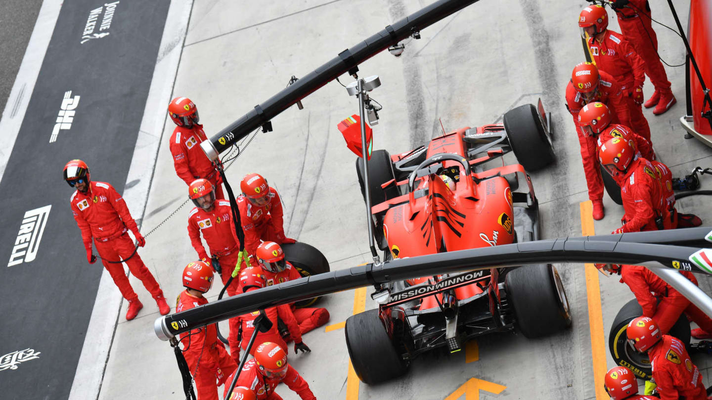 SHANGHAI INTERNATIONAL CIRCUIT, CHINA - APRIL 14: Sebastian Vettel, Ferrari SF90 pit stop during