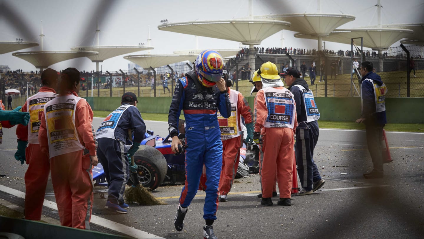SHANGHAI INTERNATIONAL CIRCUIT, CHINA - APRIL 13: Alexander Albon, Toro Rosso, walks away from his car after losing control and hitting a barrier towards the end of practice 3 during the Chinese GP at Shanghai International Circuit on April 13, 2019 in Shanghai International Circuit, China. (Photo by Steve Etherington / LAT Images)