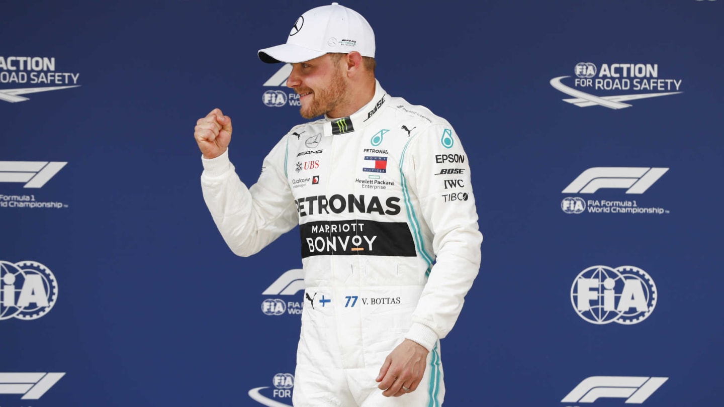 SHANGHAI INTERNATIONAL CIRCUIT, CHINA - APRIL 13: Valtteri Bottas, Mercedes AMG F1 celebrates pole position in Parc Ferme during the Chinese GP at Shanghai International Circuit on April 13, 2019 in Shanghai International Circuit, China. (Photo by Glenn Dunbar / LAT Images)