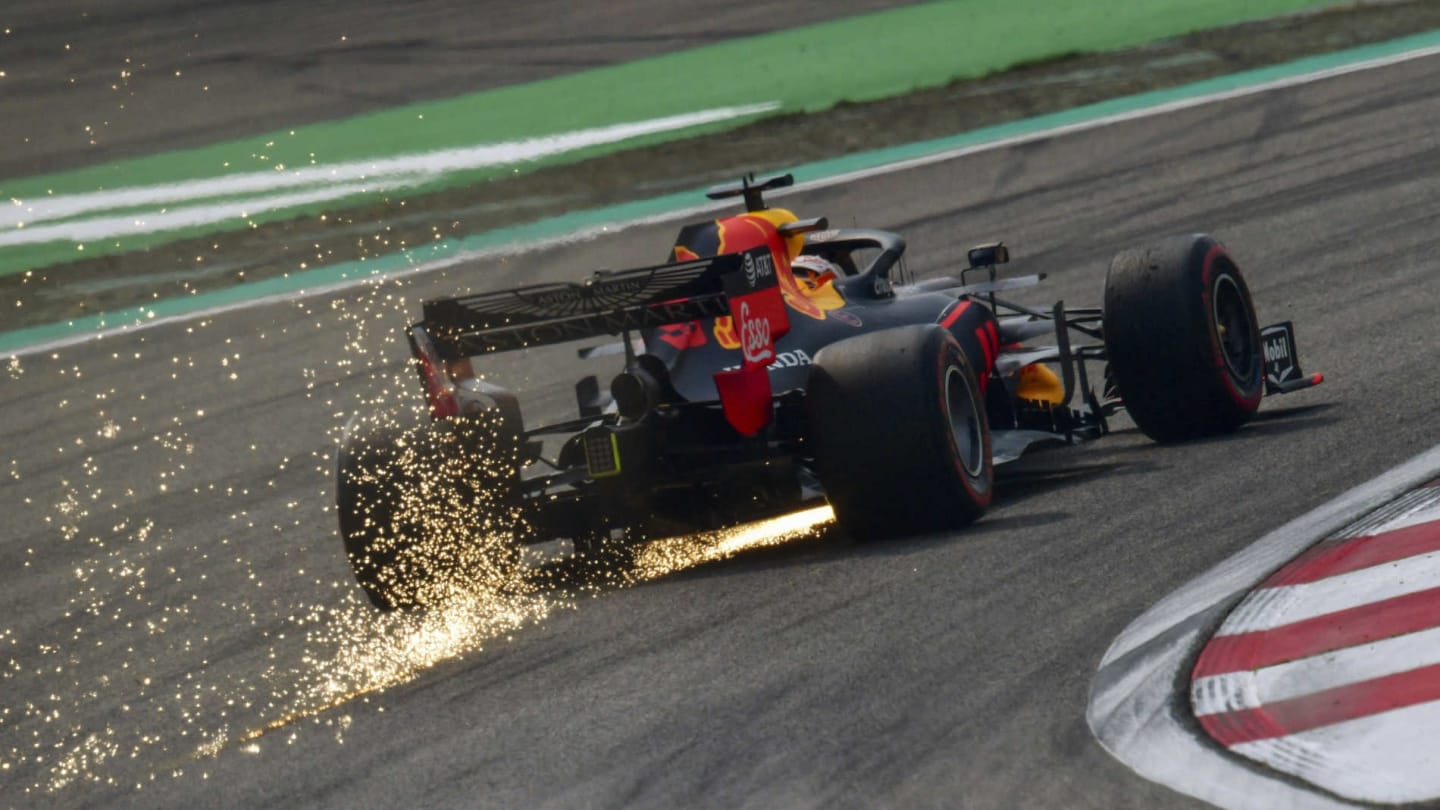 SHANGHAI INTERNATIONAL CIRCUIT, CHINA - APRIL 13: Sparks kick up from the rear of Max Verstappen,