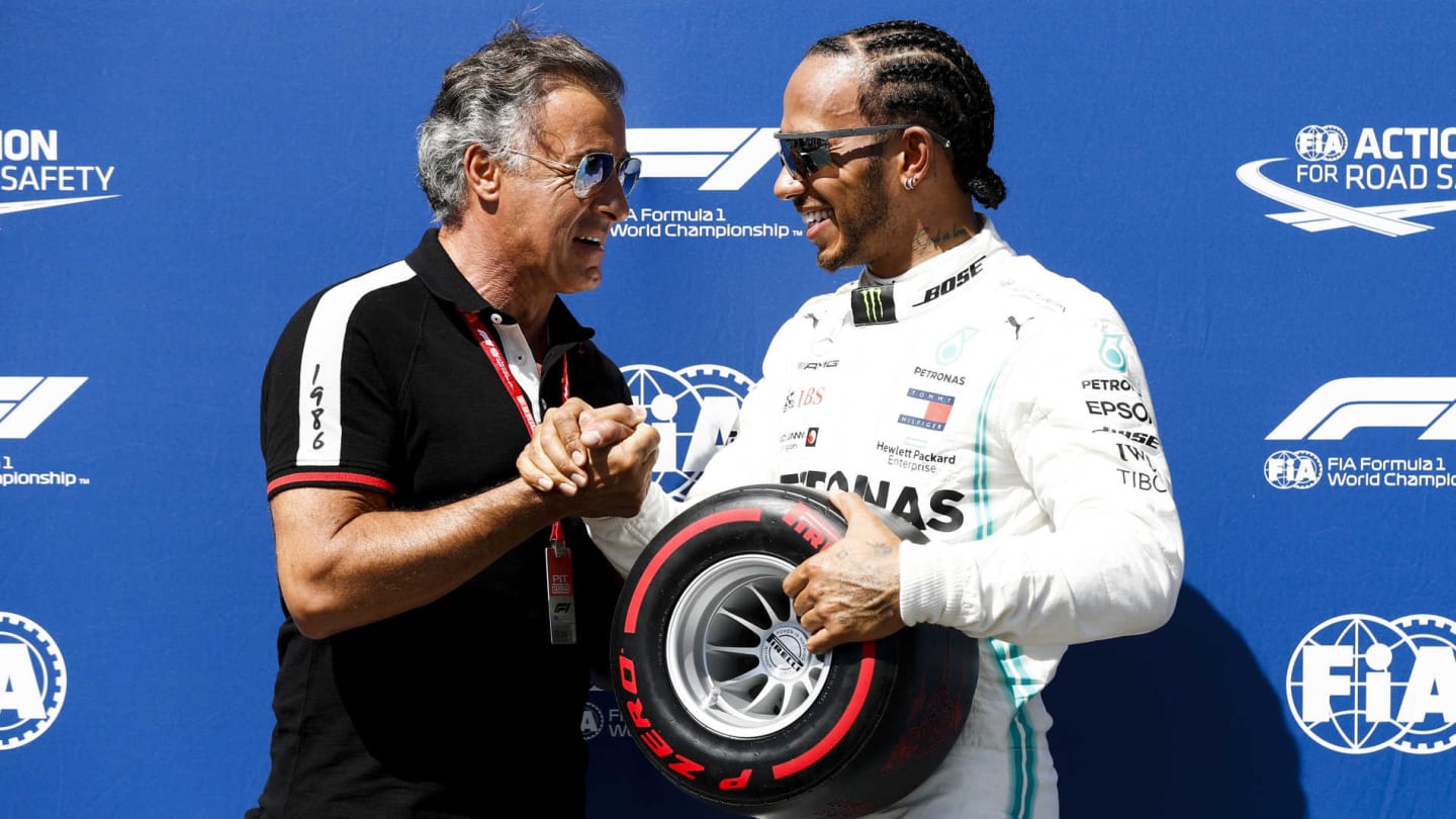 CIRCUIT PAUL RICARD, FRANCE - JUNE 22: Jean Alesi presents Lewis Hamilton, Mercedes AMG F1, with his Pirelli Pole Position award during the French GP at Circuit Paul Ricard on June 22, 2019 in Circuit Paul Ricard, France. (Photo by Glenn Dunbar / LAT Images)