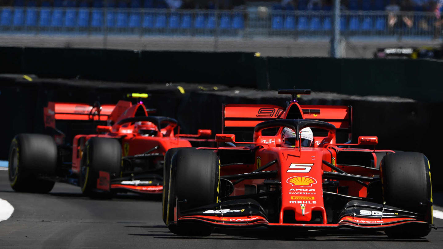 CIRCUIT PAUL RICARD, FRANCE - JUNE 22: Sebastian Vettel, Ferrari SF90, leads Charles Leclerc,