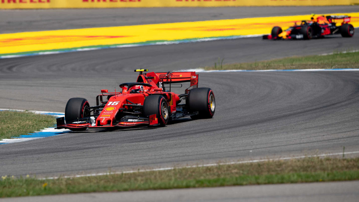 HOCKENHEIMRING, GERMANY - JULY 26: Charles Leclerc, Ferrari SF90, leads Pierre Gasly, Red Bull