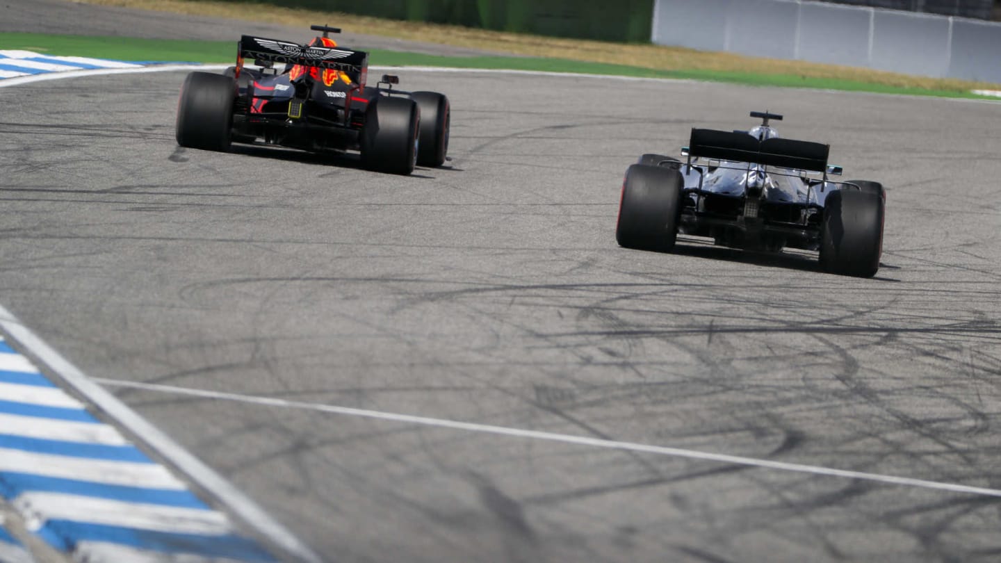 HOCKENHEIMRING, GERMANY - JULY 26: Max Verstappen, Red Bull Racing RB15, leads Lewis Hamilton,