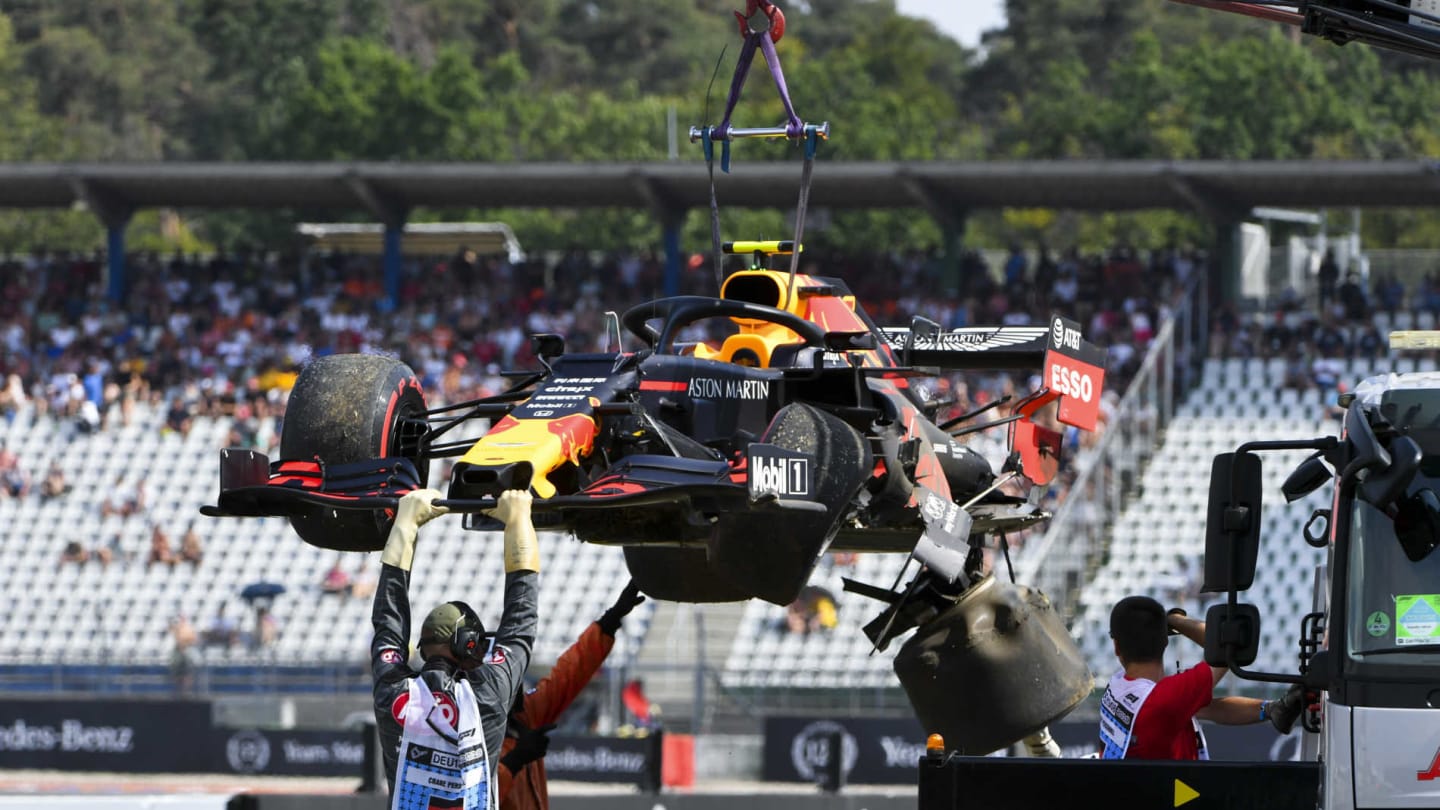 HOCKENHEIMRING, GERMANY - JULY 26: Marshals deal with the damaged car of Pierre Gasly, Red Bull Racing RB15 during the German GP at Hockenheimring on July 26, 2019 in Hockenheimring, Germany. (Photo by Mark Sutton / Sutton Images)