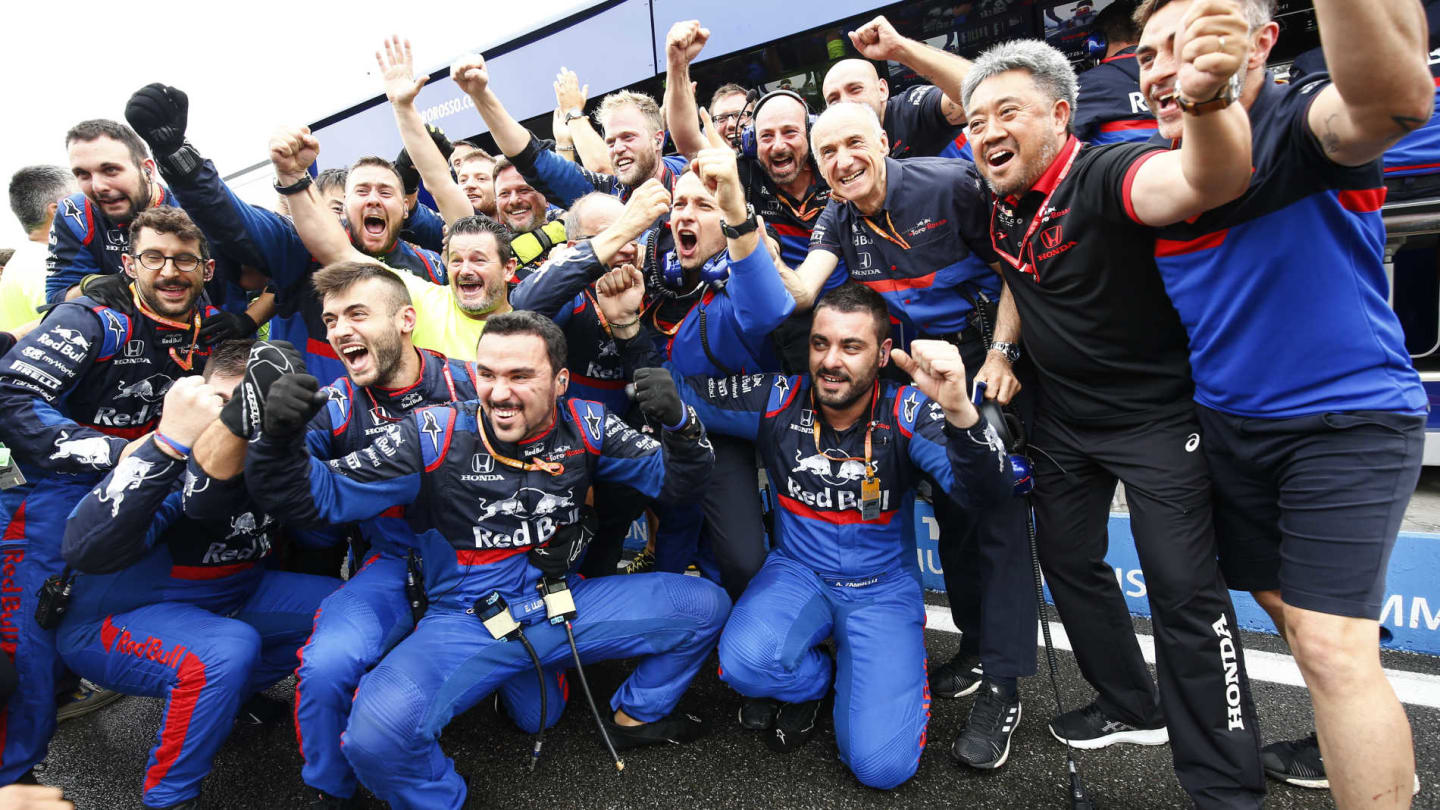 HOCKENHEIMRING, GERMANY - JULY 28: The Toro Rosso team celebrate a podium finish for Daniil Kvyat,