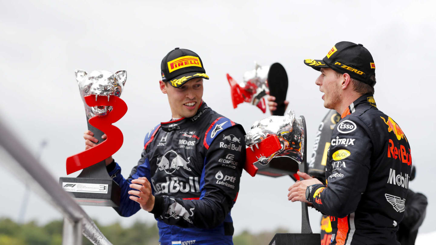 HOCKENHEIMRING, GERMANY - JULY 28: Daniil Kvyat, Toro Rosso, 3rd position, and Max Verstappen, Red