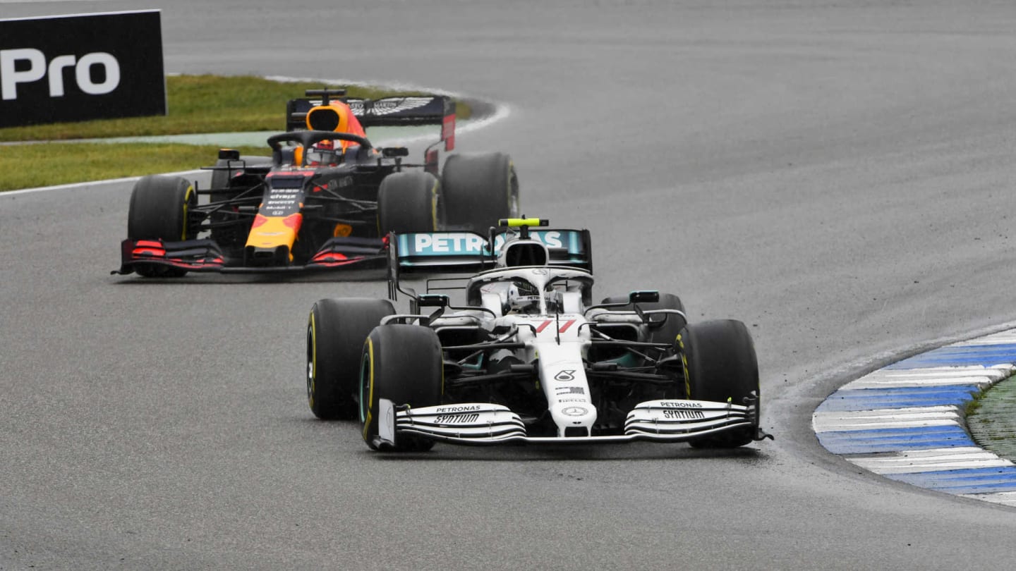 HOCKENHEIMRING, GERMANY - JULY 28: Valtteri Bottas, Mercedes AMG W10, leads Max Verstappen, Red