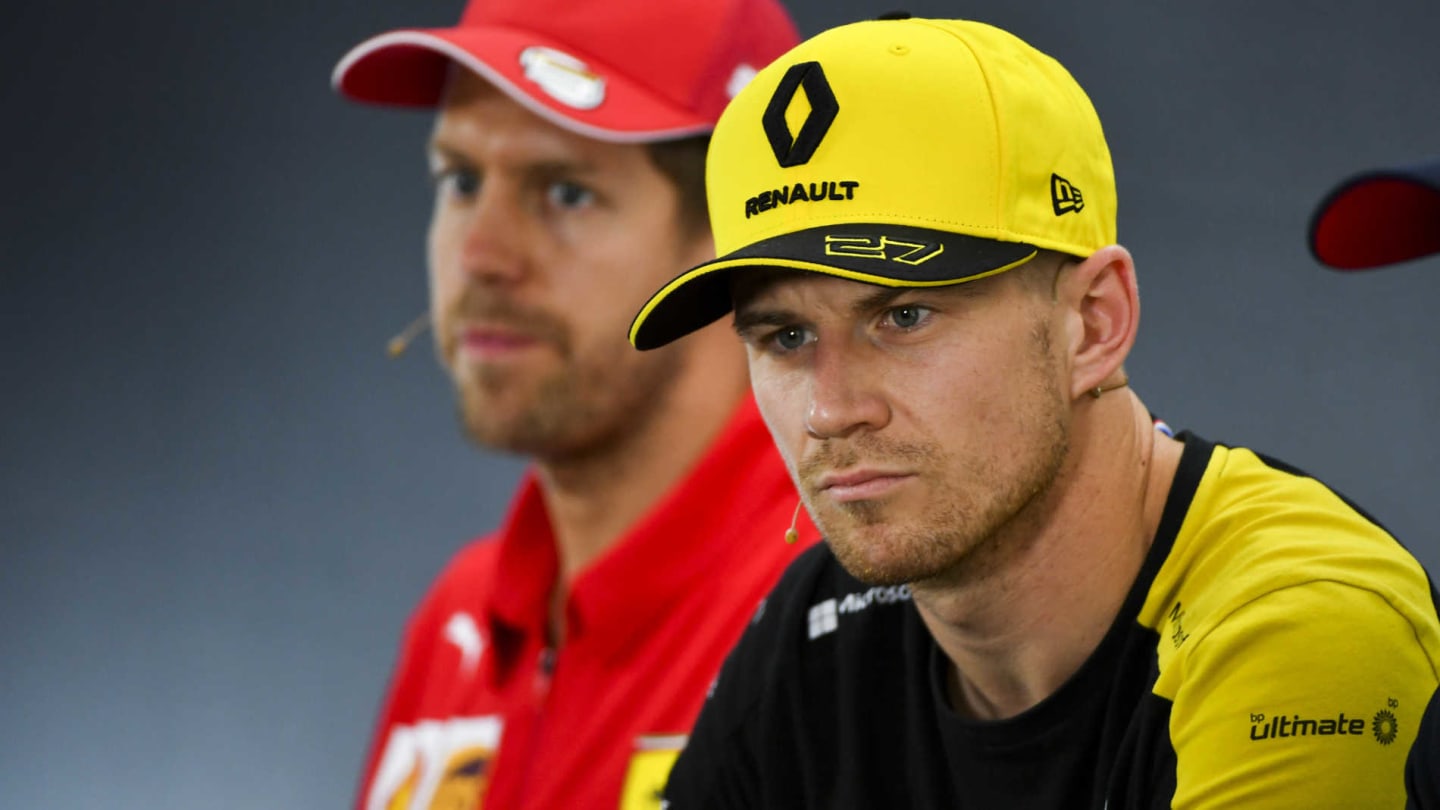 HOCKENHEIMRING, GERMANY - JULY 25: Nico Hulkenberg, Renault F1 Team and Sebastian Vettel, Ferrari In the Press Conference during the German GP at Hockenheimring on July 25, 2019 in Hockenheimring, Germany. (Photo by Mark Sutton / Sutton Images)