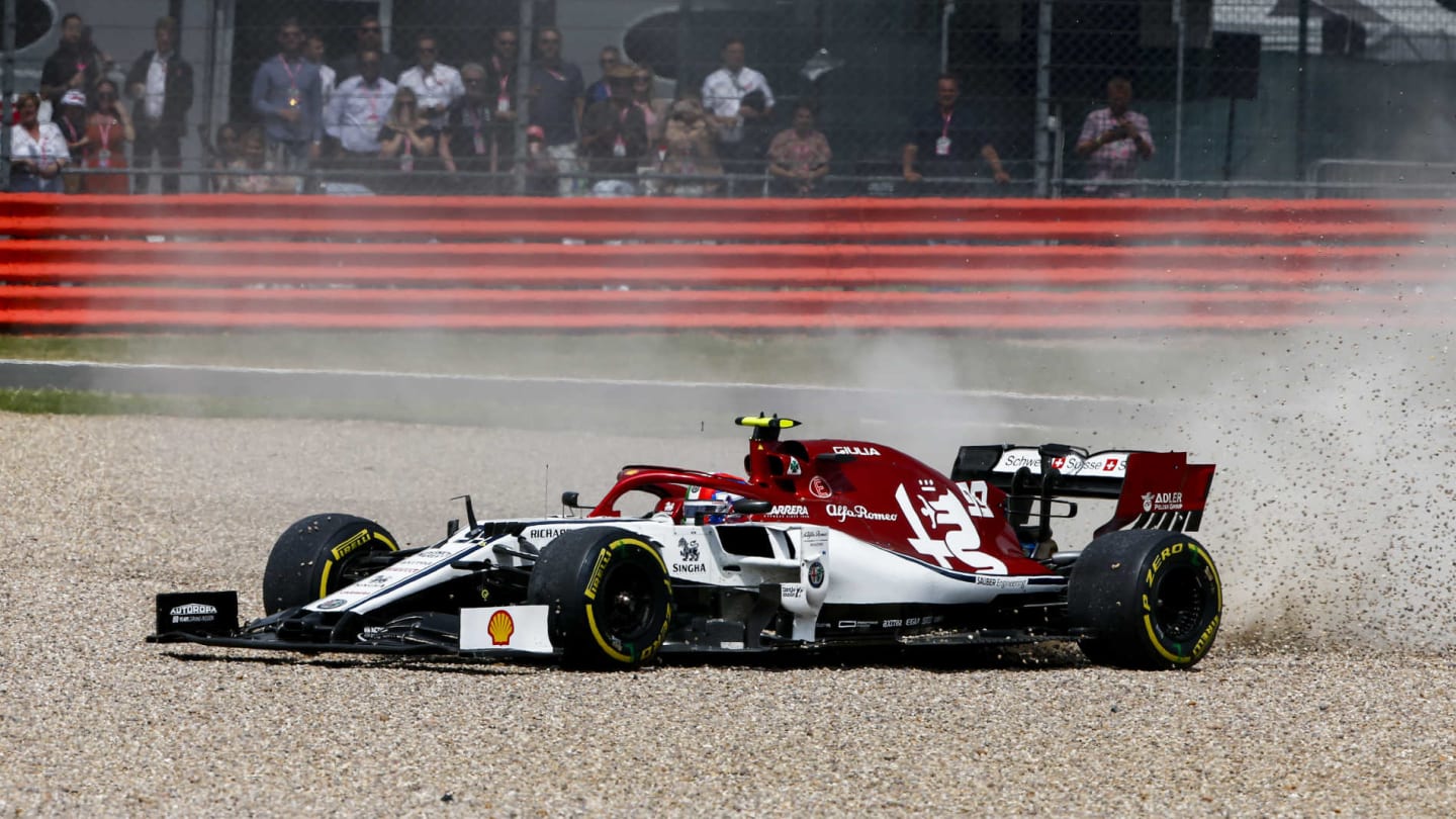 SILVERSTONE, UNITED KINGDOM - JULY 14: Antonio Giovinazzi, Alfa Romeo Racing C38, gets beached in the gravel during the British GP at Silverstone on July 14, 2019 in Silverstone, United Kingdom. (Photo by Andy Hone / LAT Images)