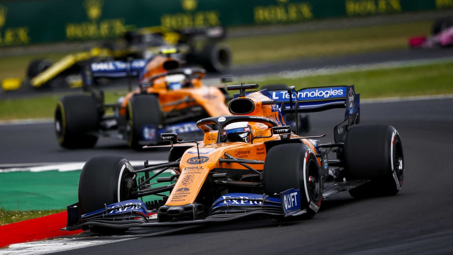 SILVERSTONE, UNITED KINGDOM - JULY 14: Carlos Sainz, McLaren MCL34, leads Lando Norris, McLaren MCL34 during the British GP at Silverstone on July 14, 2019 in Silverstone, United Kingdom. (Photo by Andy Hone / LAT Images)