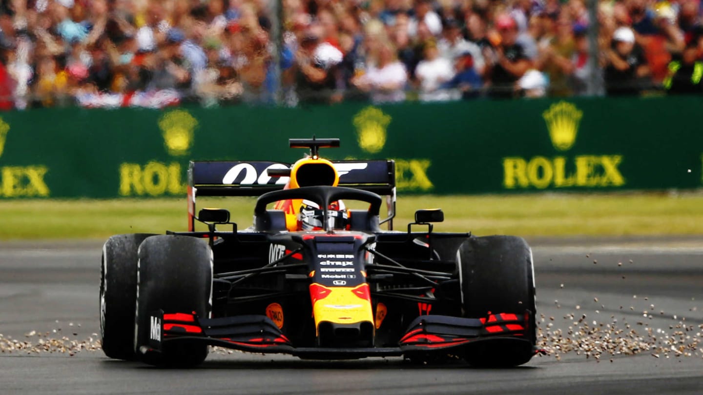 SILVERSTONE, UNITED KINGDOM - JULY 14: Max Verstappen, Red Bull Racing RB15, spins after a crash with Sebastian Vettel, Ferrari SF90 during the British GP at Silverstone on July 14, 2019 in Silverstone, United Kingdom. (Photo by Andy Hone / LAT Images)