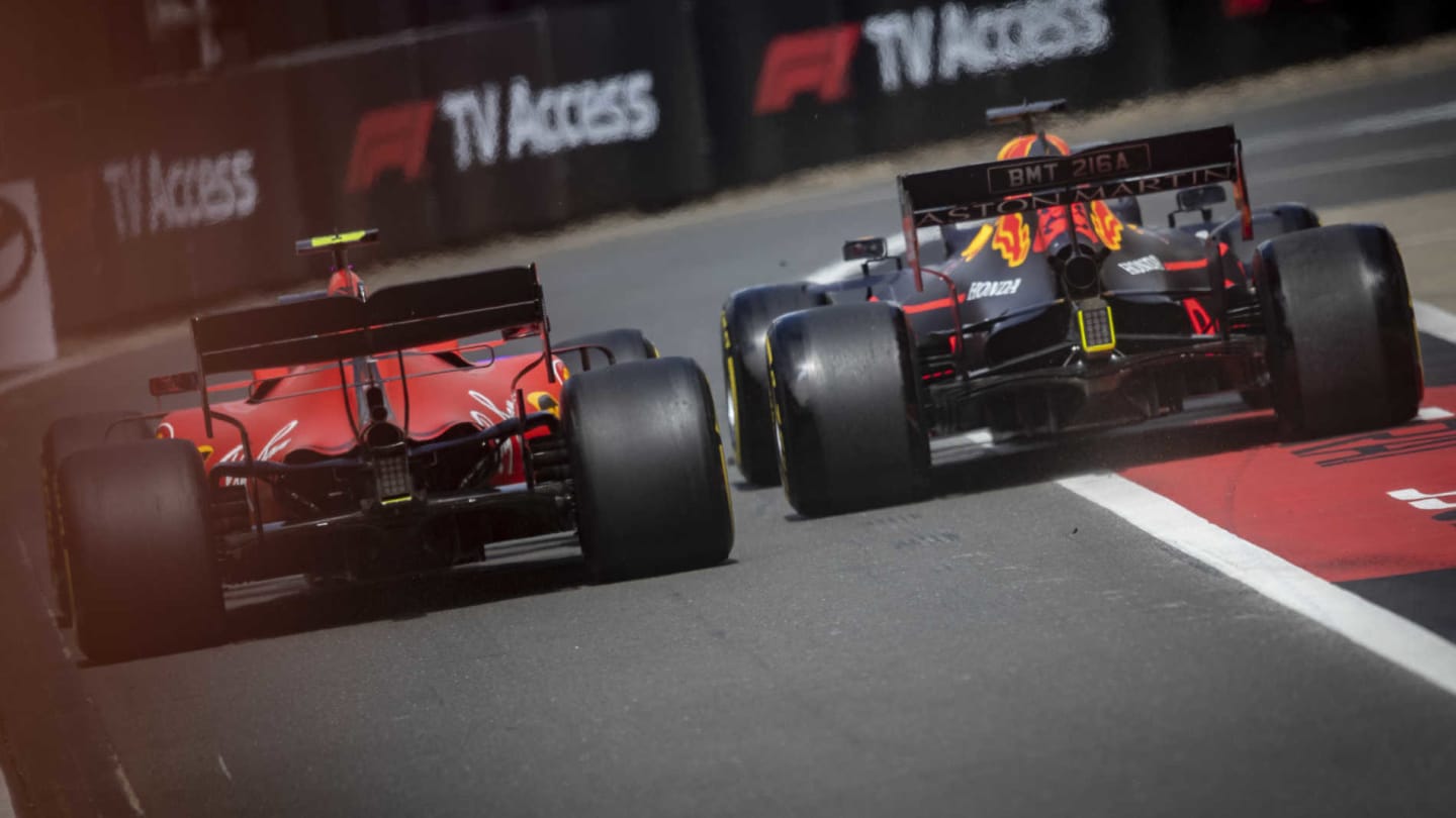 SILVERSTONE, UNITED KINGDOM - JULY 14: Max Verstappen, Red Bull Racing RB15 and Charles Leclerc,