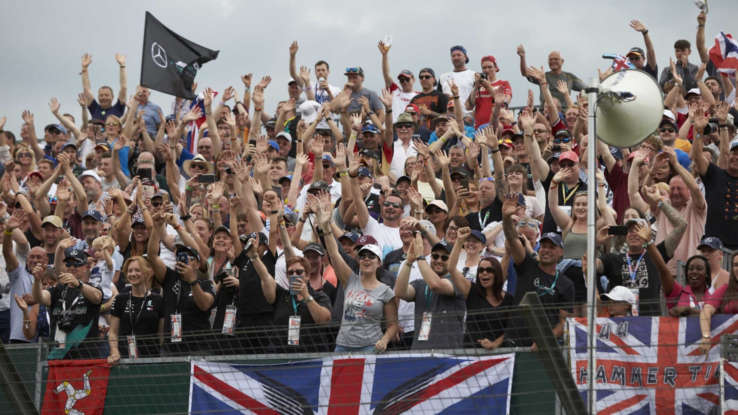 SILVERSTONE, UNITED KINGDOM - JULY 11: Fans of Lewis Hamilton, Mercedes AMG F1, cheer during the