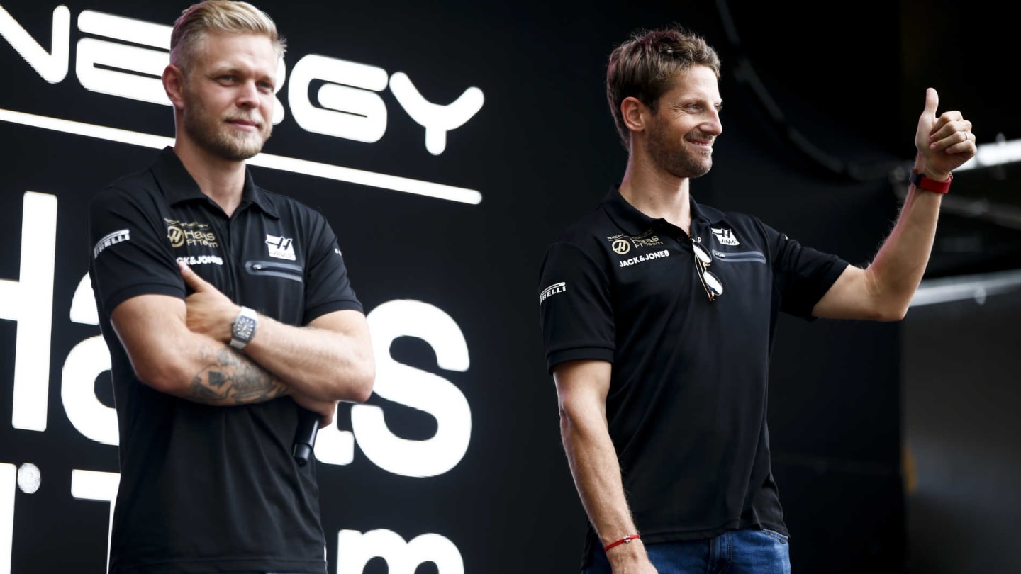 HUNGARORING, HUNGARY - AUGUST 03: Kevin Magnussen, Haas F1, and Romain Grosjean, Haas F1, on stage