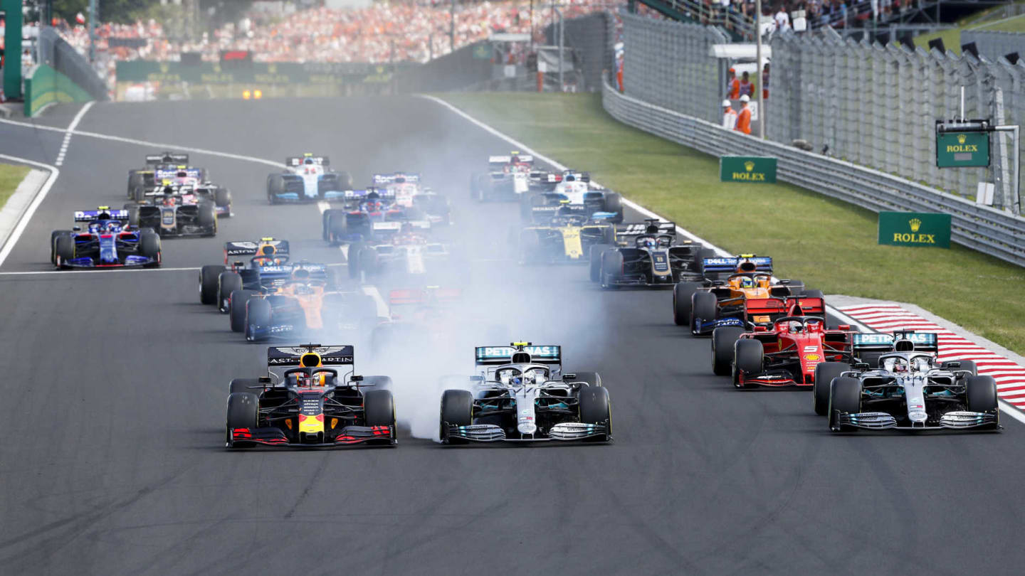 HUNGARORING, HUNGARY - AUGUST 04: Max Verstappen, Red Bull Racing RB15 leads Valtteri Bottas,