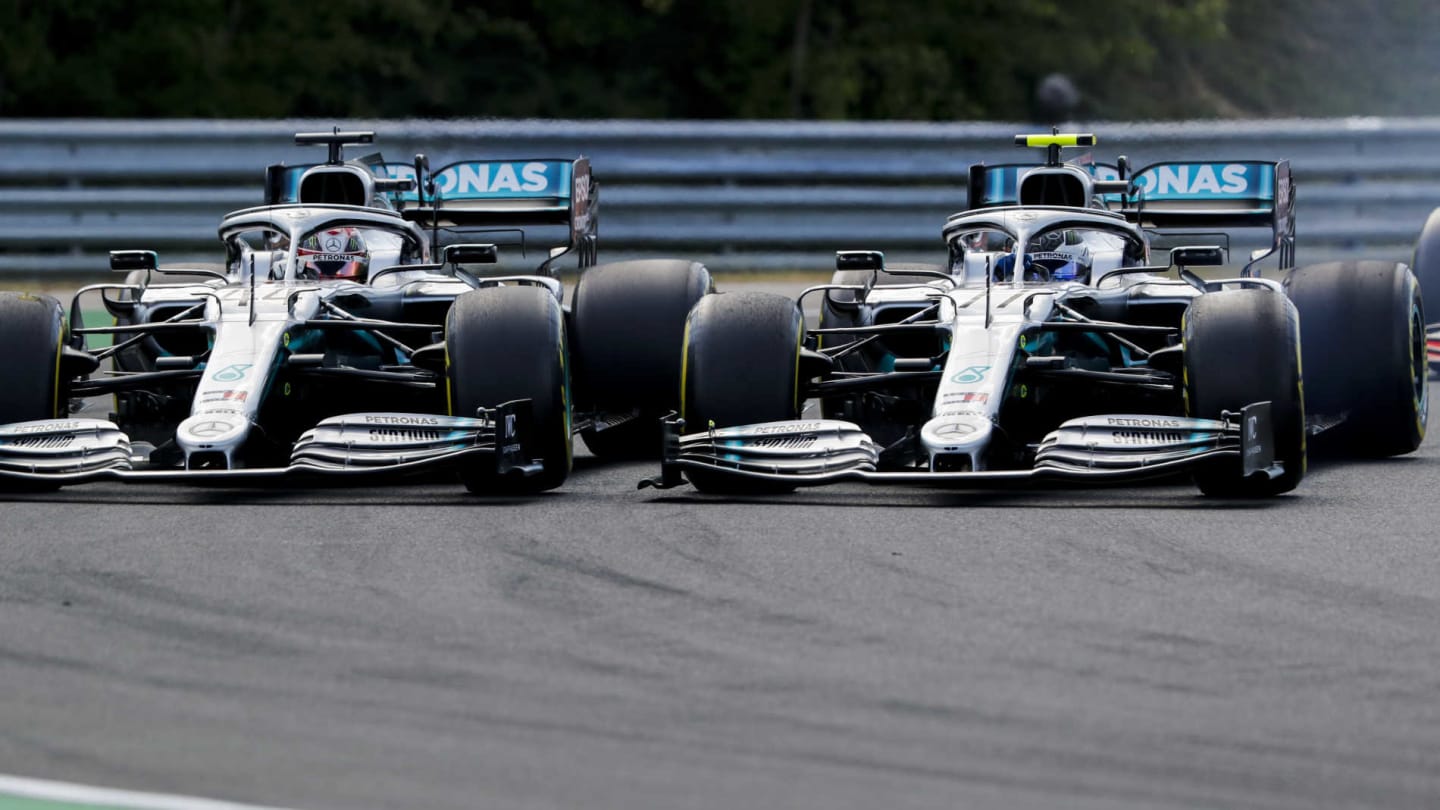 HUNGARORING, HUNGARY - AUGUST 04: Lewis Hamilton, Mercedes AMG F1 W10, battles with Valtteri