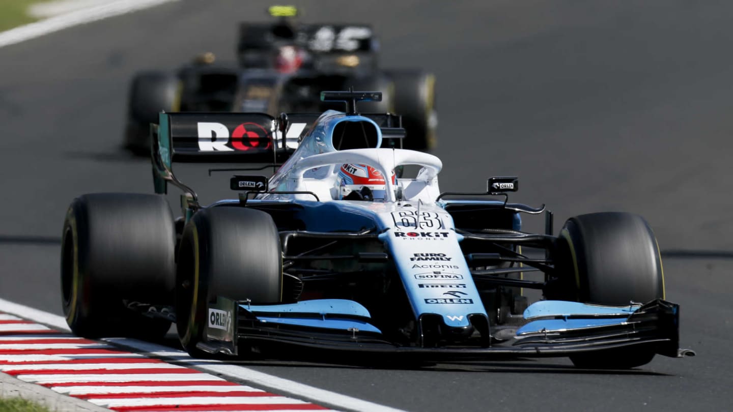 HUNGARORING, HUNGARY - AUGUST 04: George Russell, Williams Racing FW42, leads Kevin Magnussen, Haas