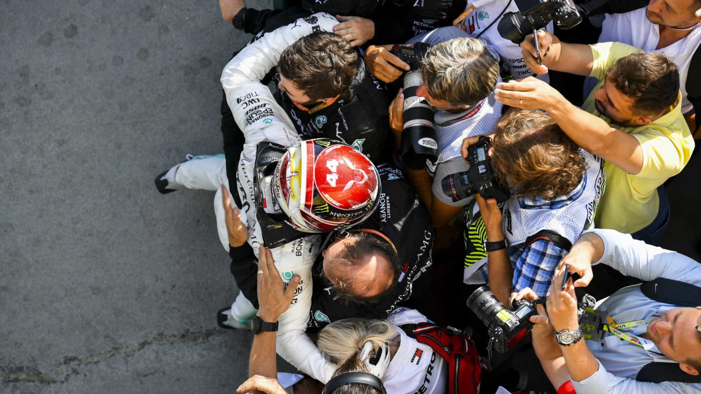 HUNGARORING, HUNGARY - AUGUST 04: Lewis Hamilton, Mercedes AMG F1, 1st position, celebrates with his team in Parc Ferme during the Hungarian GP at Hungaroring on August 04, 2019 in Hungaroring, Hungary. (Photo by Mark Sutton / Sutton Images)