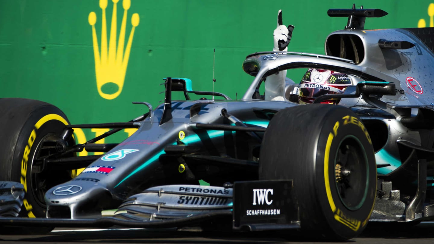 HUNGARORING, HUNGARY - AUGUST 04: Lewis Hamilton, Mercedes AMG F1 W10, 1st position, celebrates after taking the Chequered flag during the Hungarian GP at Hungaroring on August 04, 2019 in Hungaroring, Hungary. (Photo by Sam Bloxham / LAT Images)