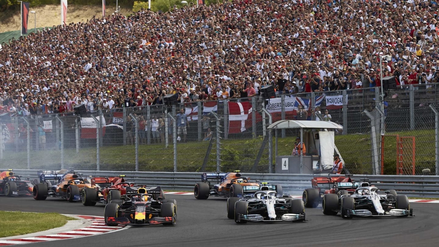 HUNGARORING, HUNGARY - AUGUST 04: Max Verstappen, Red Bull Racing RB15, leads Lewis Hamilton,