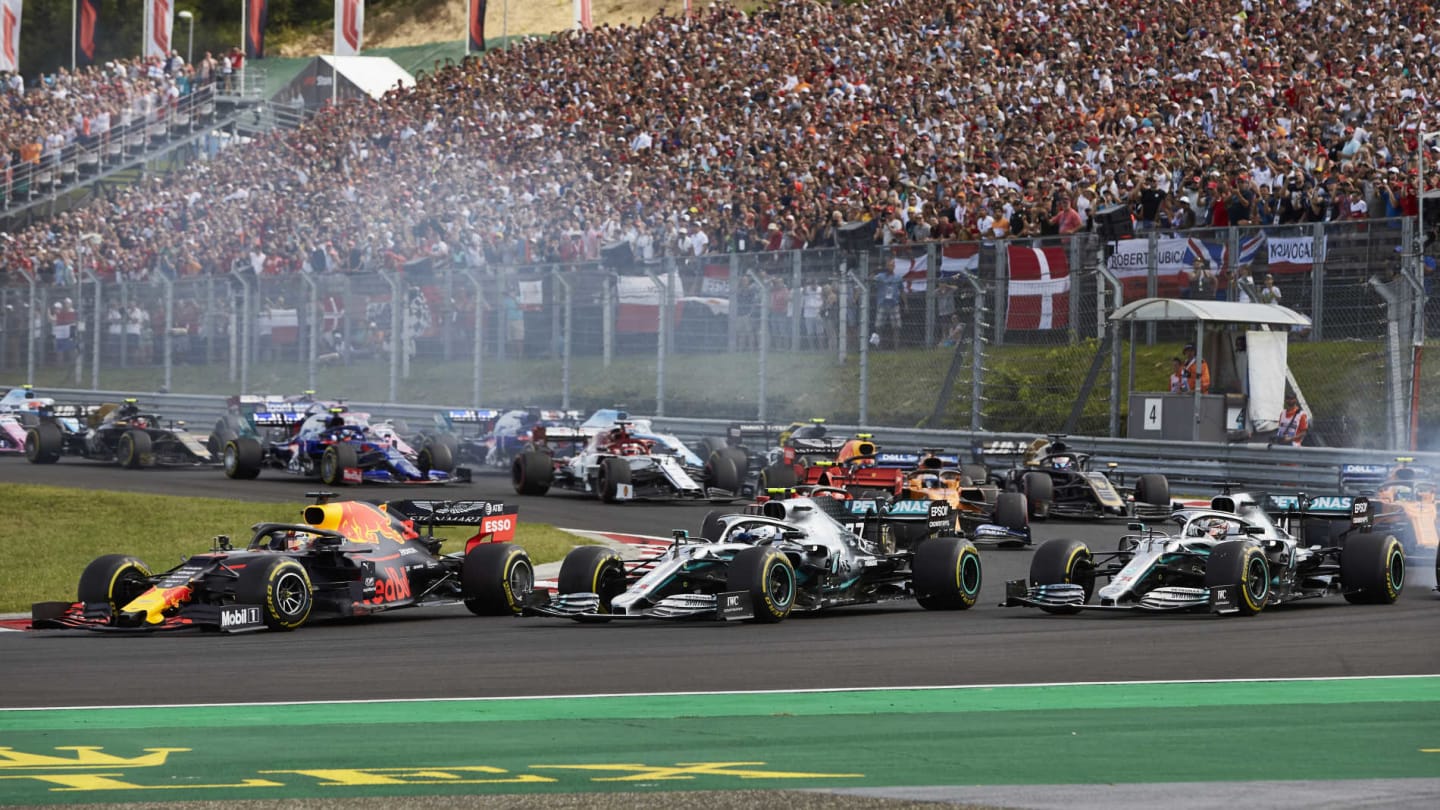 HUNGARORING, HUNGARY - AUGUST 04: Max Verstappen, Red Bull Racing RB15, leads Lewis Hamilton,