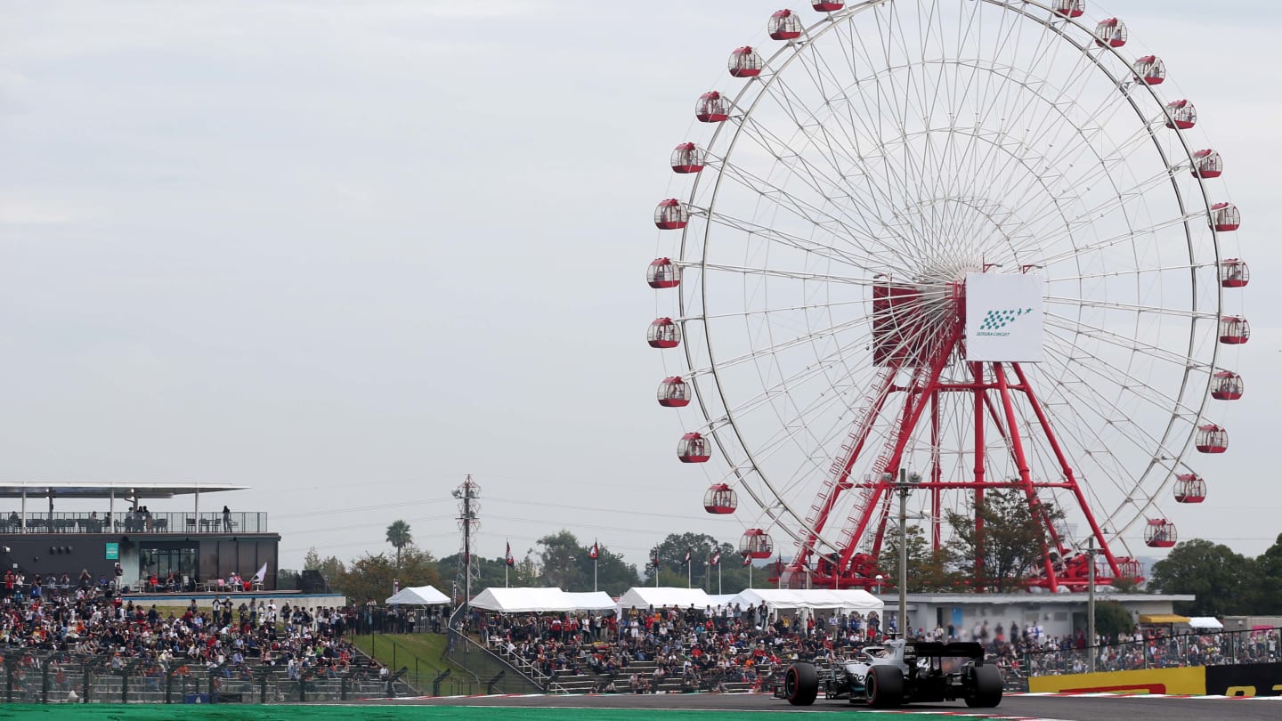 SUZUKA, JAPAN - OCTOBER 11: Lewis Hamilton of Great Britain driving the (44) Mercedes AMG Petronas