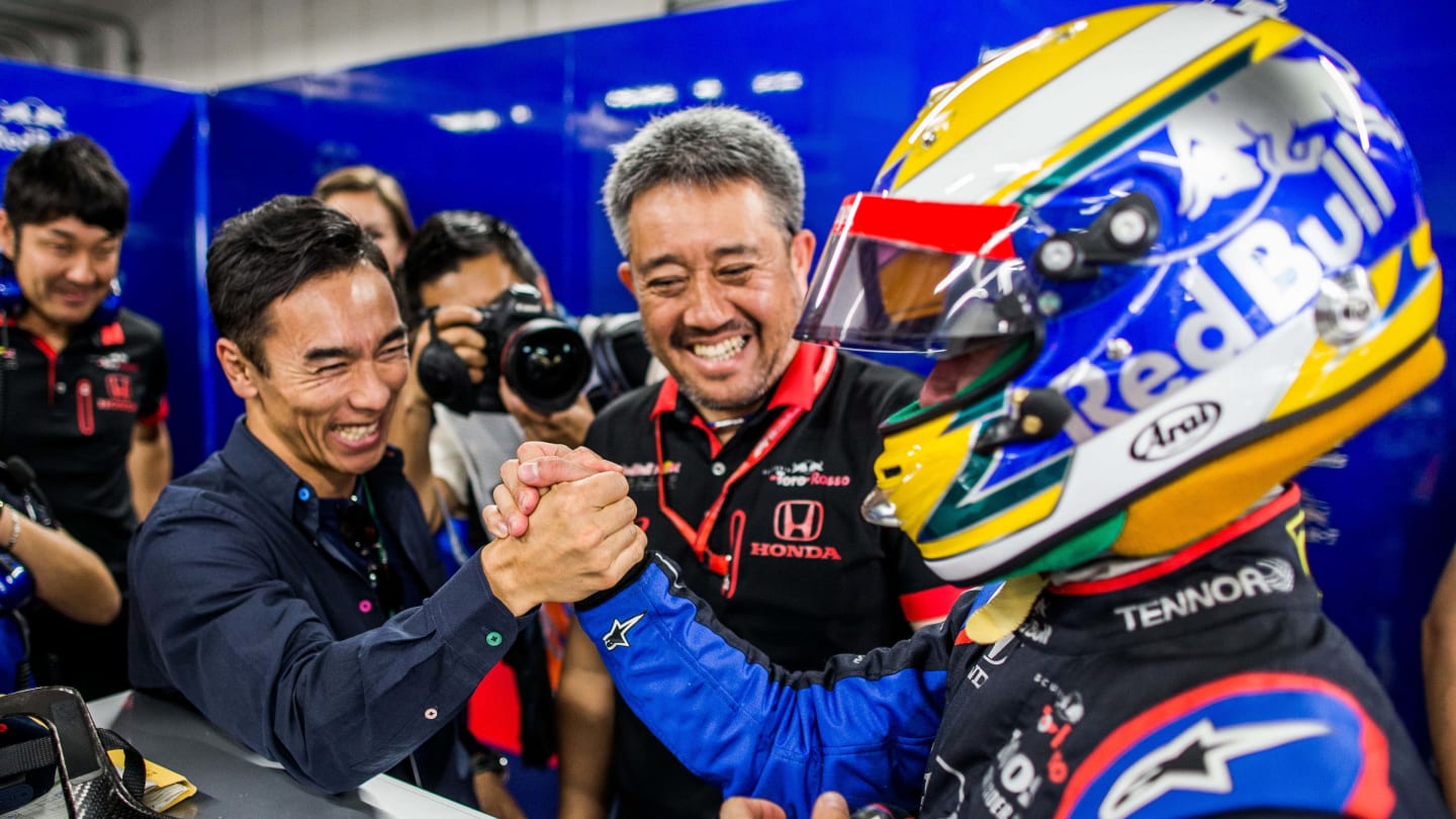 SUZUKA, JAPAN - OCTOBER 11: Takuma Sato of Japan with Masashi Yamamoto of Honda and Japan congratulates Naoki Yamamoto of Scuderia Toro Rosso and Japan during practice for the F1 Grand Prix of Japan at Suzuka Circuit on October 11, 2019 in Suzuka, Japan. (Photo by Peter Fox/Getty Images)